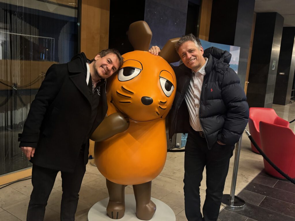 Two Simplexity team members at a broadcaster