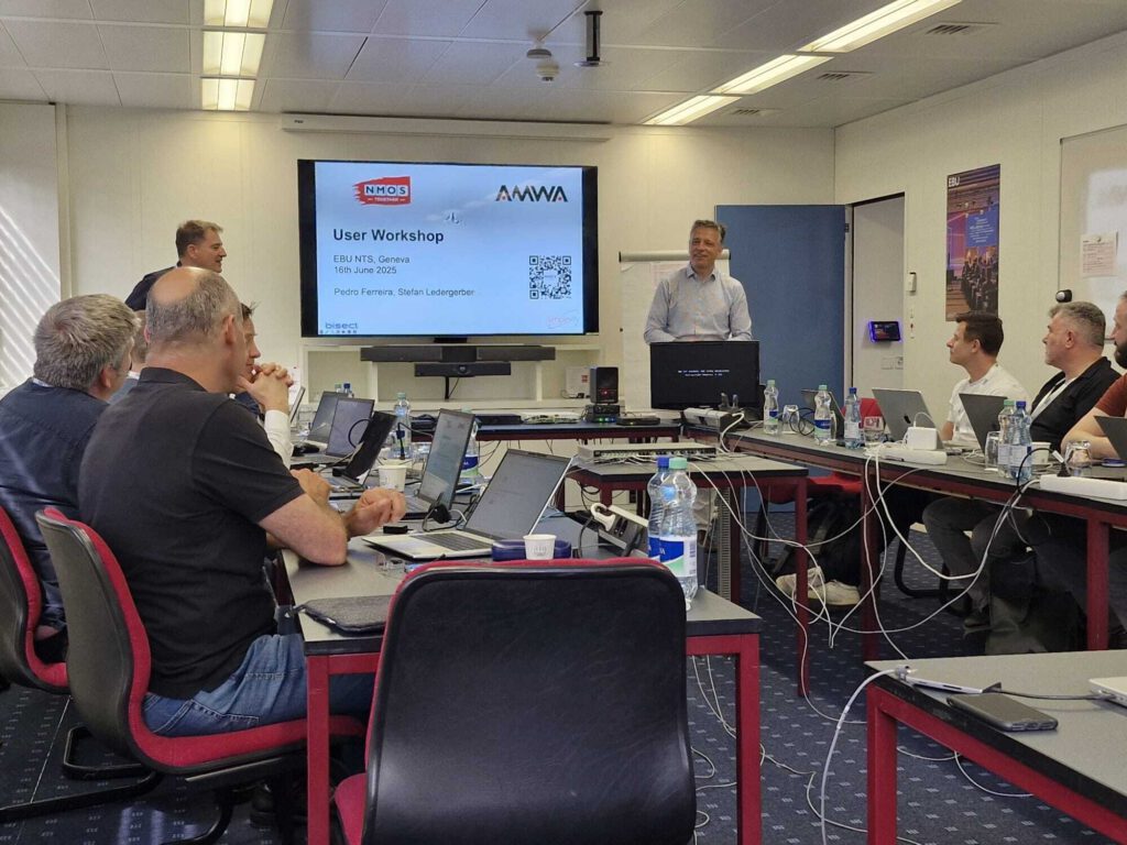 Workshop participants working at laptops
