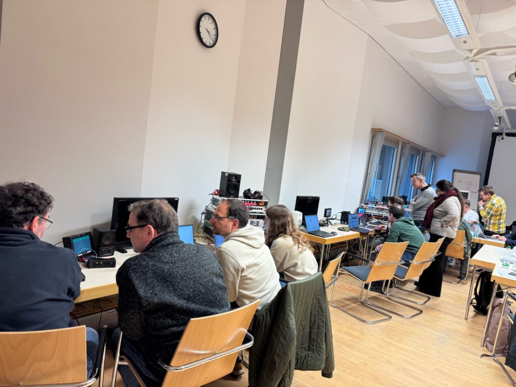 Training room with participants at laptops