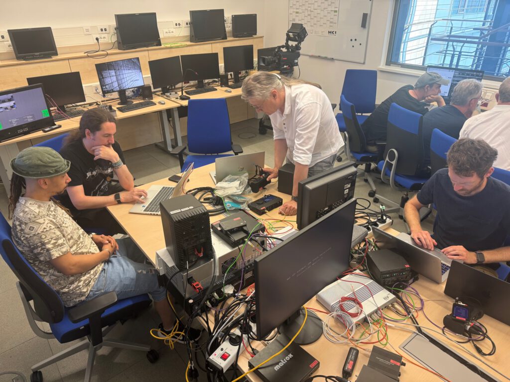 Participants configuring devices during a course